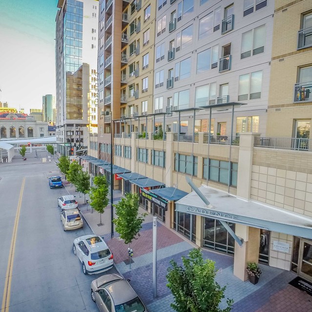 Cadence Union Station Apartments  - Aerial View of City with High-Rise Buildings, Cranes, and Greenery