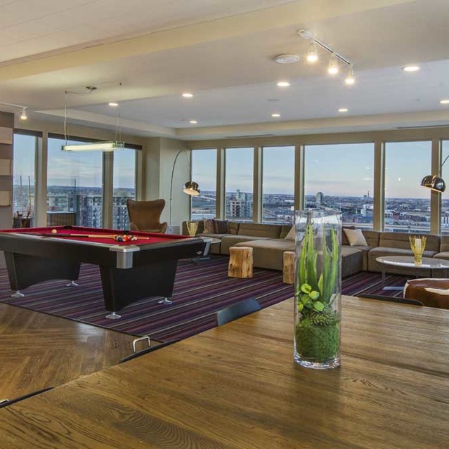 Cadence Union Station Apartments - Modern Lounge with Pool Table, City View, and Contemporary Furniture