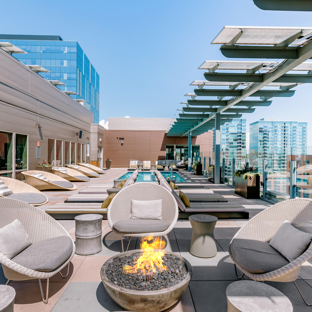 Cadence Union Station Apartments - Rooftop Lounge with Fire pit, Pool, and Modern Outdoor Furniture 