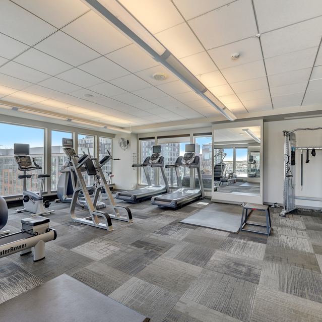 Cadence Union Station Apartments - Modern Gym with Treadmills, Bikes, and Weight Equipment